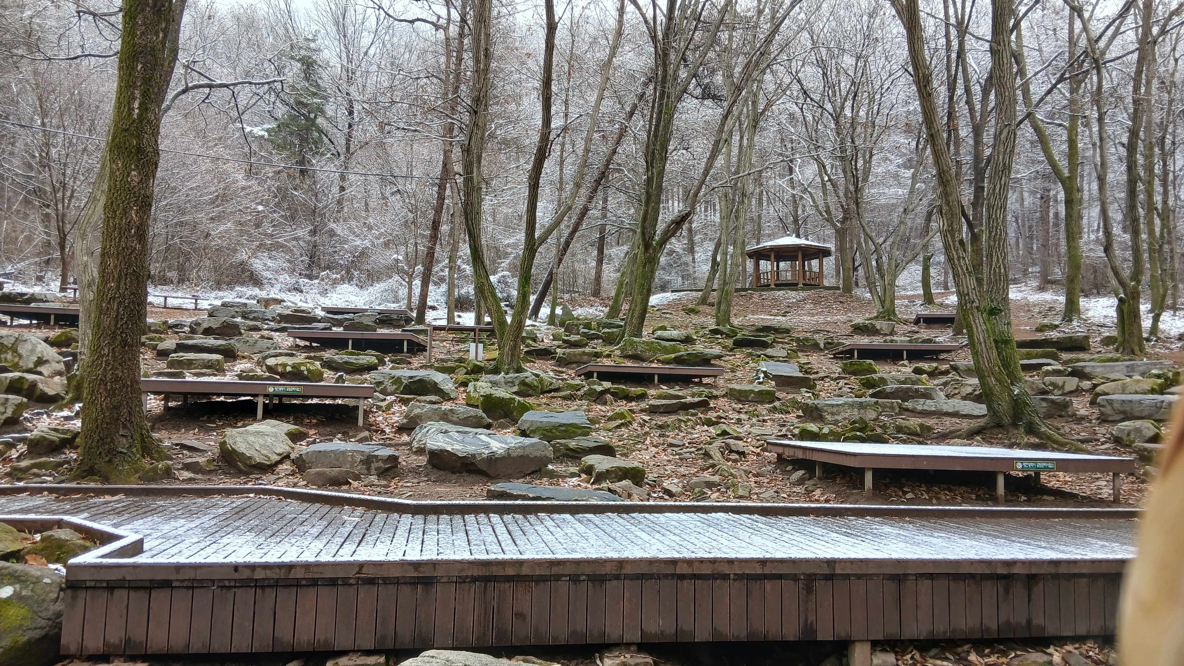 painting of man hiking in snow